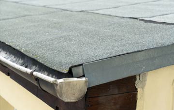 repair or replace Tremains flat roofing?